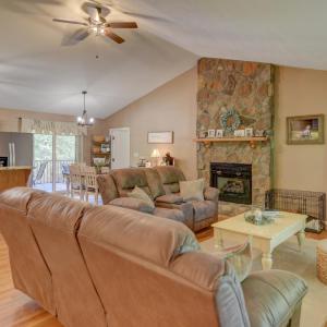 Main level open floor plan with access to large screened in porch, with exterior entrance into bathroom for pool guests