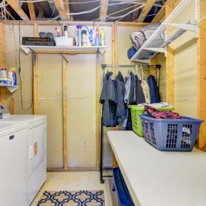 unfinished separated laundry room, just across from the basement entry to the patio and pool - easy to drop your wet clothes, or dirty clothes if you've been working outside in the yard.
