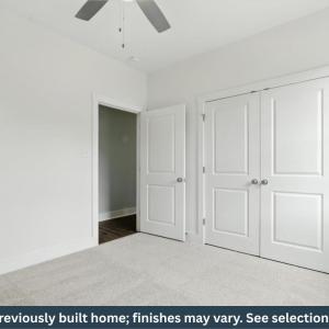 Bedroom 3 with carpet and ceiling fan