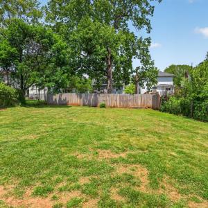 Beautiful open, flat backyard. fully fenced and ready to garden or add a play yard! Wonderful for hosting.