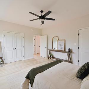 main level primary bedroom with dual closets