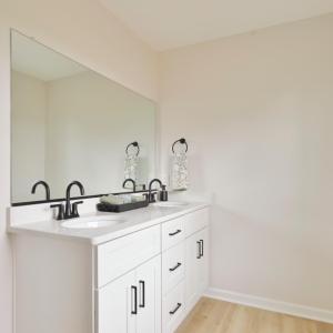 2nd full bathroom, with double vanity, located upstairs