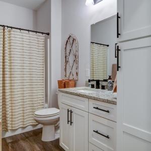 Bedroom 2 & 3 - shared bathroom - granite counter tops. tub & shower