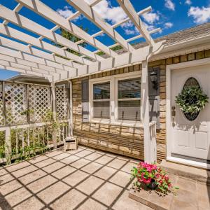 Pergola on spacious front porch