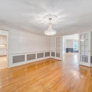 Formal dining room accented by chair rail and wainscoting