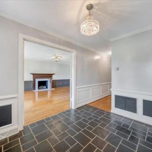 The foyer is the perfect place to greet guests.  To the left is the formal living room and to the right is the large main level family room