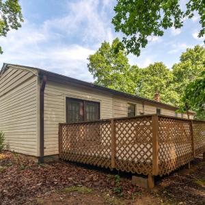 Back side of the house with shed in far right background