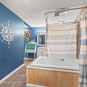 downstairs full bath. Jacuzzi tub with shower ring