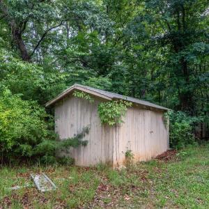 Storage shed outside the entrance wall to the downstairs