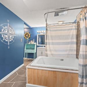 downstairs full bath. Jacuzzi tub with shower ring