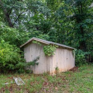 Storage shed outside the entrance wall to the downstairs