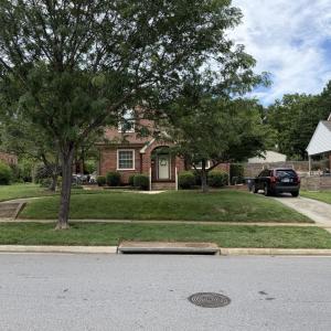 Ample off-street parking with 1 car garage at the end of the driveway.