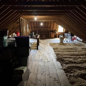 R30 Cellulose Insulation Blown In Under Flooring and Open Area in 2014.