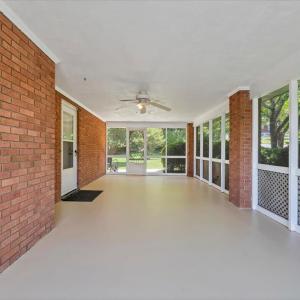 The screened-in porch extends the home's living area and provides an excellent opportunity for future expansion.
