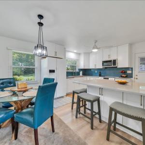 Brand new kitchen cabinets, counter tops, back splash, lighting, plumbing, hardware, and appliances with abundant cabinet space!