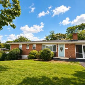 Newly updated home with two separate paved driveways servicing the main level and finished terrace level! Perfect home for a family, multigenerational, or investment property!