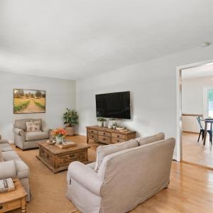 This virtual staging shows off how large this living room is and how it could be designed.