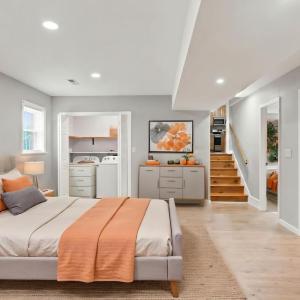 This virtual staging shows the basement as a primary bedrooms or inlaw suite.