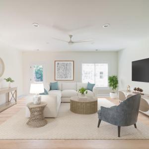 Living room with door to exterior patio.  Similar to photos.