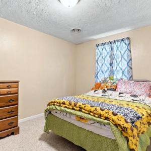 Unit A - Bedroom - pictured altered to remove personal belongings