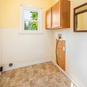 Large laundry/storage/mud  room