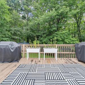The oversized deck looked out into a mostly level backyard!