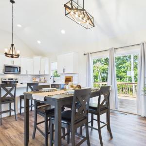 Bright Dining Area with easy access to the Rear Deck for Indoor and Outdoor Entertaining.