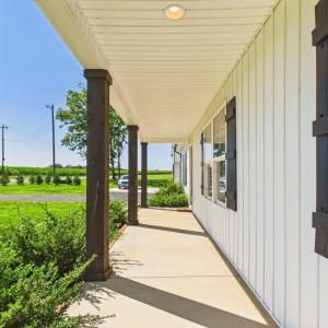 Covered Front Porch welcomes you home and creates the perfect place to relax and enjoy Country Living.