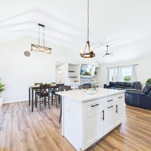 Open Kitchen flows seamlessly into the Dining Area and Great Room—ideal for Everyday Living and Entertaining. Large Center Island offers additional workspace, seating, and gathering space for family and guests.