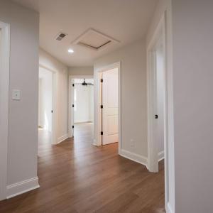 Lots of storage upstairs- with 3 bedrooms, 2 full bathrooms, laundry room and storage closets.