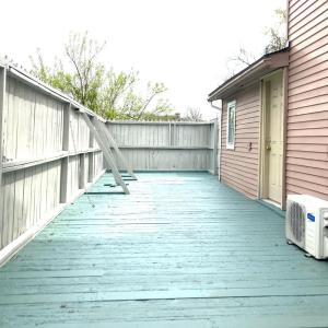 LARGE PRIVACY FENCED SIDE PORCH WITH BRAND NEW MINI SPLITS