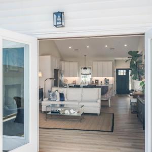Double French doors that open in den to outdoor patio which gives full panoramic mountain views