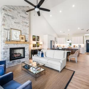 Inviting great room with vaulted ceilings, gas logs and beautiful mountain views