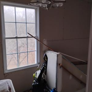 ENTERANCE TO BASEMENT OFF LAUNDRY ROOM