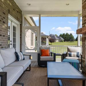 Screened porch with gas fireplace.