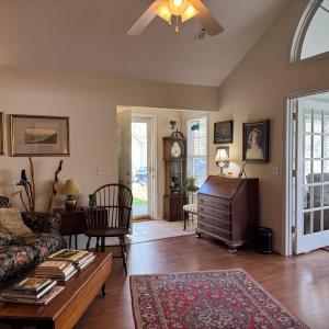 Walking into the front door you enter the Greatroom with the Vaulted Ceiling and the Fabulous Sunroom on the right.