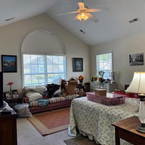 Primary Bedroom suite is down the hallway from the Dining Room with hall access and private bedroom access to the bathroom. It also has a (larger) walk-in closet