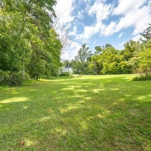 844 Old Forest Rd also conveys. It has parking on it, some nice bushes and trees and spacious peaceful feeling!