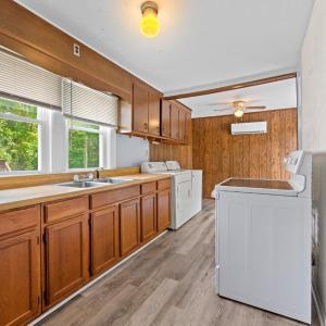 Nice kitchen has new refrigerator, and new washer/dryer