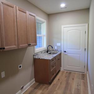 Laundry room with pantry