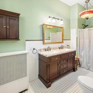Full spacious bathroom conveniently attached to main level bedroom (ensuite).