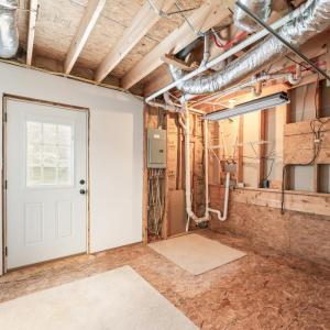Laundry room walks out to back yard.