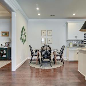 View from Great Room towards the formal Dining room (on the left) and Kitchen seating nook (straight ahead)