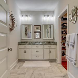Primary Bedroom, dual sinks, walk-in closet, water closet, ceramic tile floors