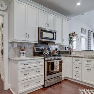 Kitchen work space, Gas Range, Microwave, Granite Countertops, Sink