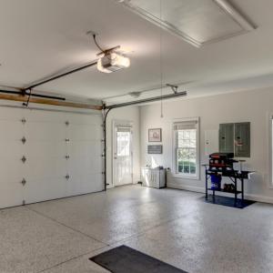 Large Garage with new Epoxy Floor and additional exterior door entry