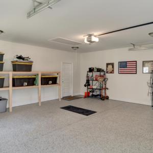 Large Garage with built in shelving and attic pull down access