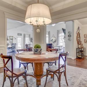 Formal Dining Room, and views into the foyer and Kitchen & Great room of the home