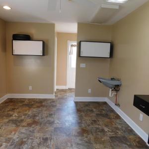 Additional room in new addition, half bath through