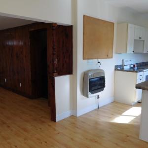 Dining  looking into living room and kitchen